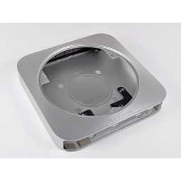 Mac mini Середина 2010 года Замена внешнего корпуса